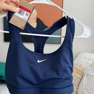 Nike women’s sports bra size large , never used. Too late to exchange